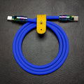 Coiled royal blue Chubby Cable USB-C to USB-C with yellow leather strap