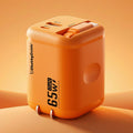Close-up of the 65W GaN orange ChubbyCable charger with a retractable cable.